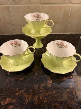 Tea cups and saucers by Meritage key lime and pink rose unique. 3 sets.